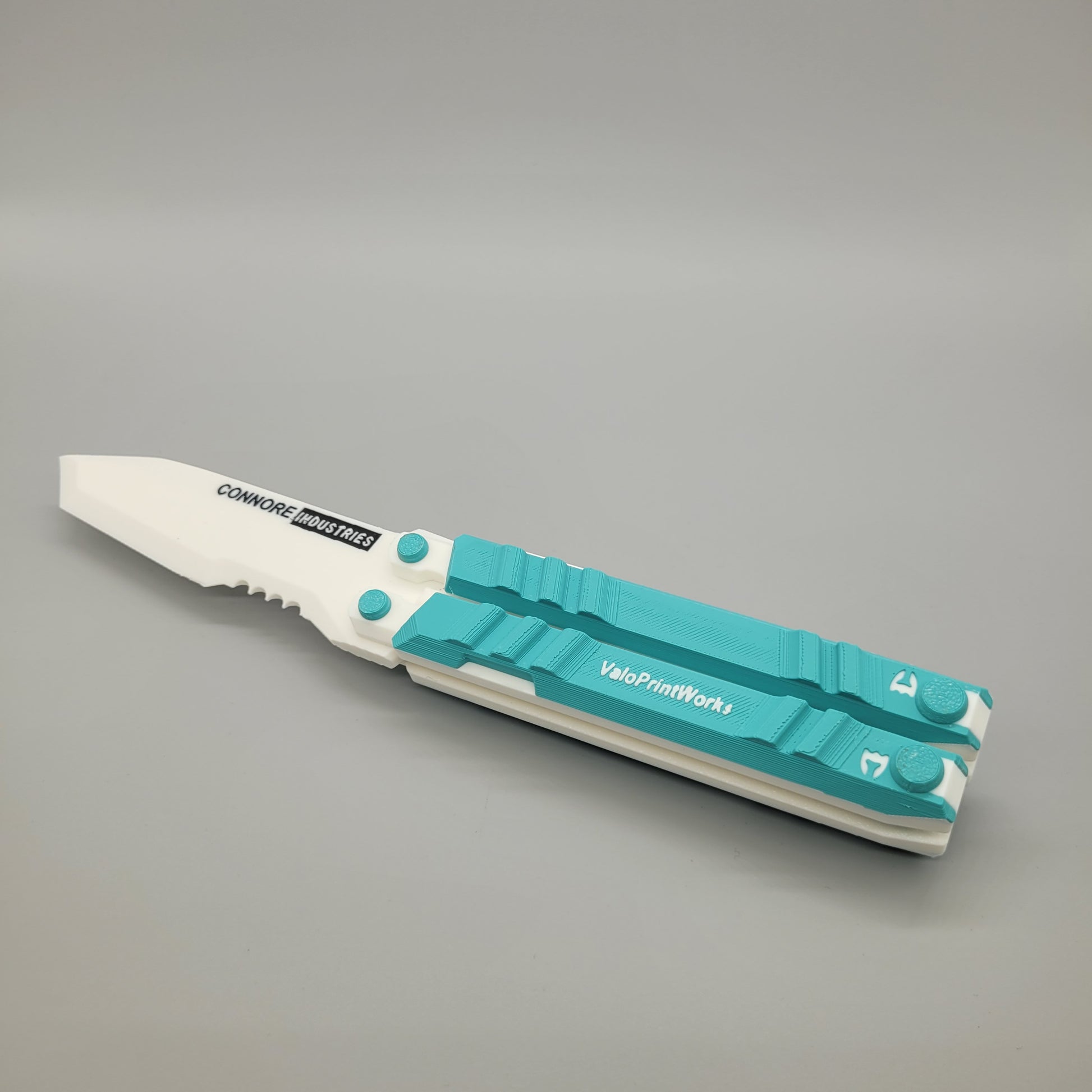 Valorant Recon Knife Skin in tuerkis-weiß frontal liegend